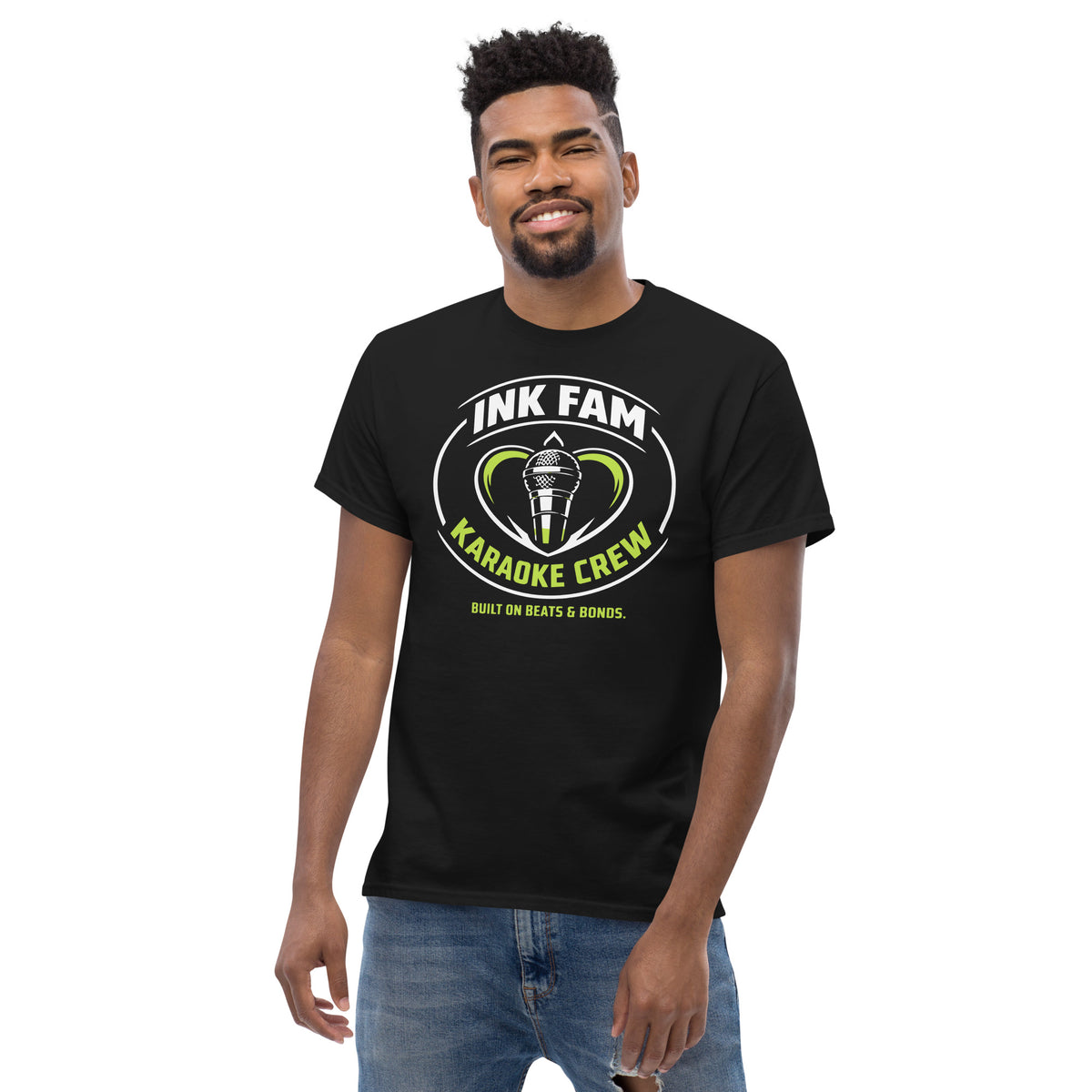 Black classic T-shirt, alternate front view, featuring DJ Ink Fam green-and-white circular microphone badge.