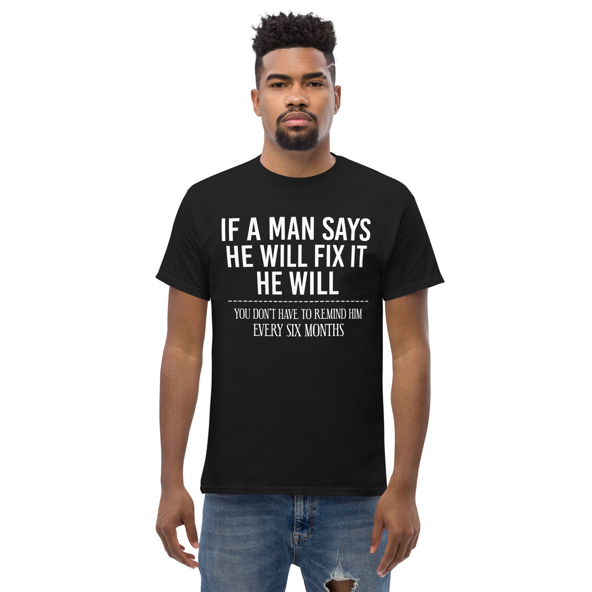 Black classic T-shirt, front view, featuring If a Man Says He Will Fix It six-month DIY reminder joke.