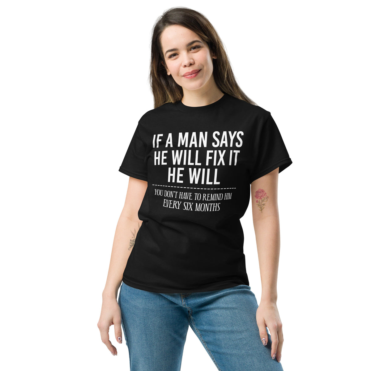 Black classic T-shirt, front view, featuring If a Man Says He Will Fix It six-month DIY reminder joke.