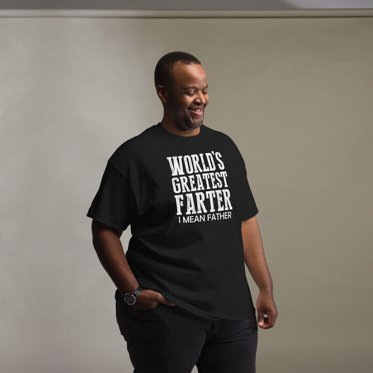 Black classic T-shirt, front view, featuring white World's Greatest Farter, I Mean Father lettering.