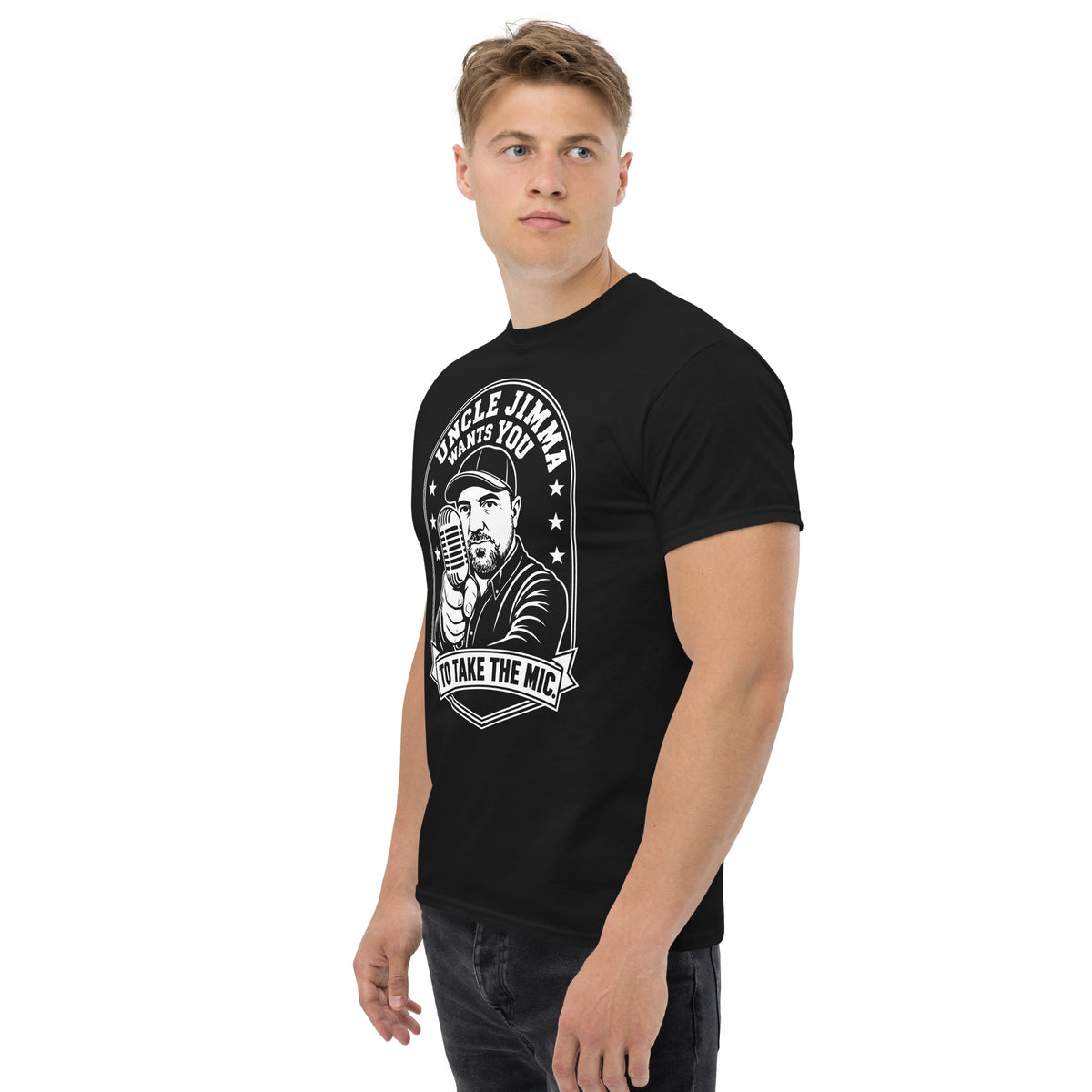 Black classic T-shirt, left-front angled view, featuring Uncle Jimma Wants You to Take the Mic pointing portrait and microphone.