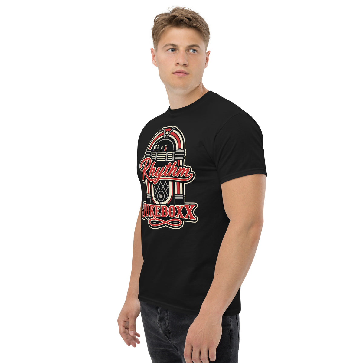 Black classic T-shirt, left-front angled view, featuring Rhythm Jukeboxx red-and-cream retro jukebox graphic.