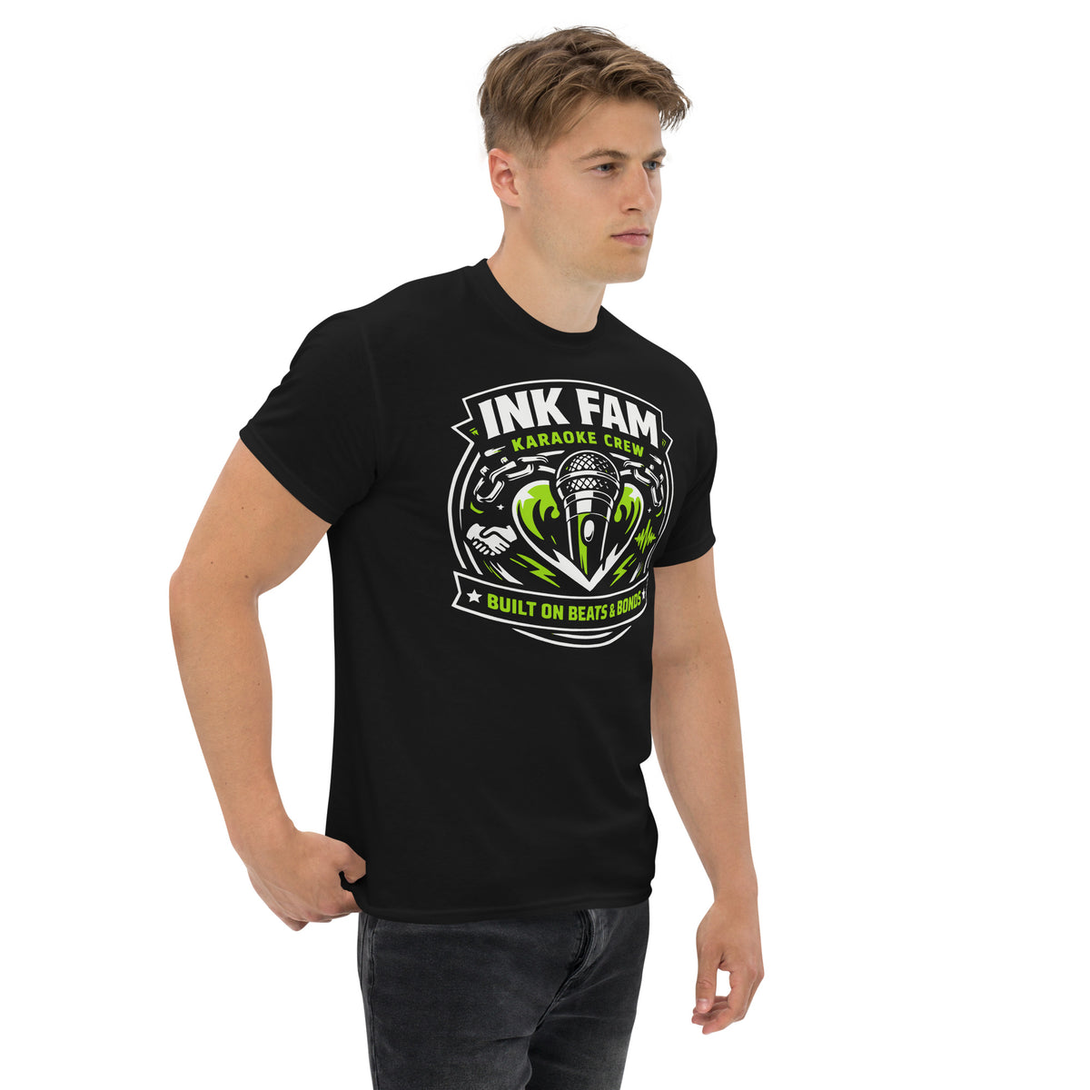 Black classic T-shirt, right-front angled view, featuring DJ Ink Beats & Bonds shield with a microphone and green-and-white lettering.
