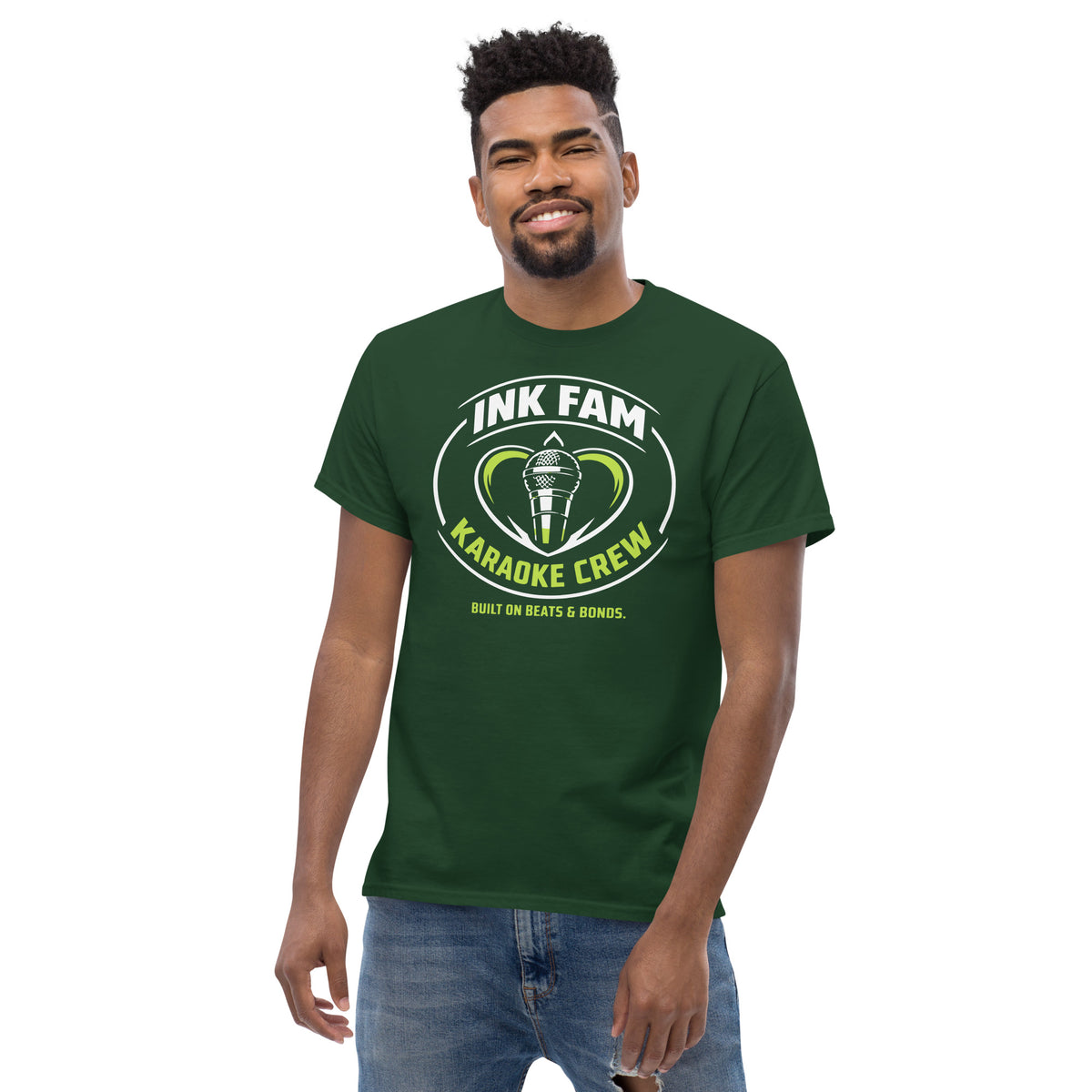 Forest Green classic T-shirt, alternate front view, featuring DJ Ink Fam green-and-white circular microphone badge.