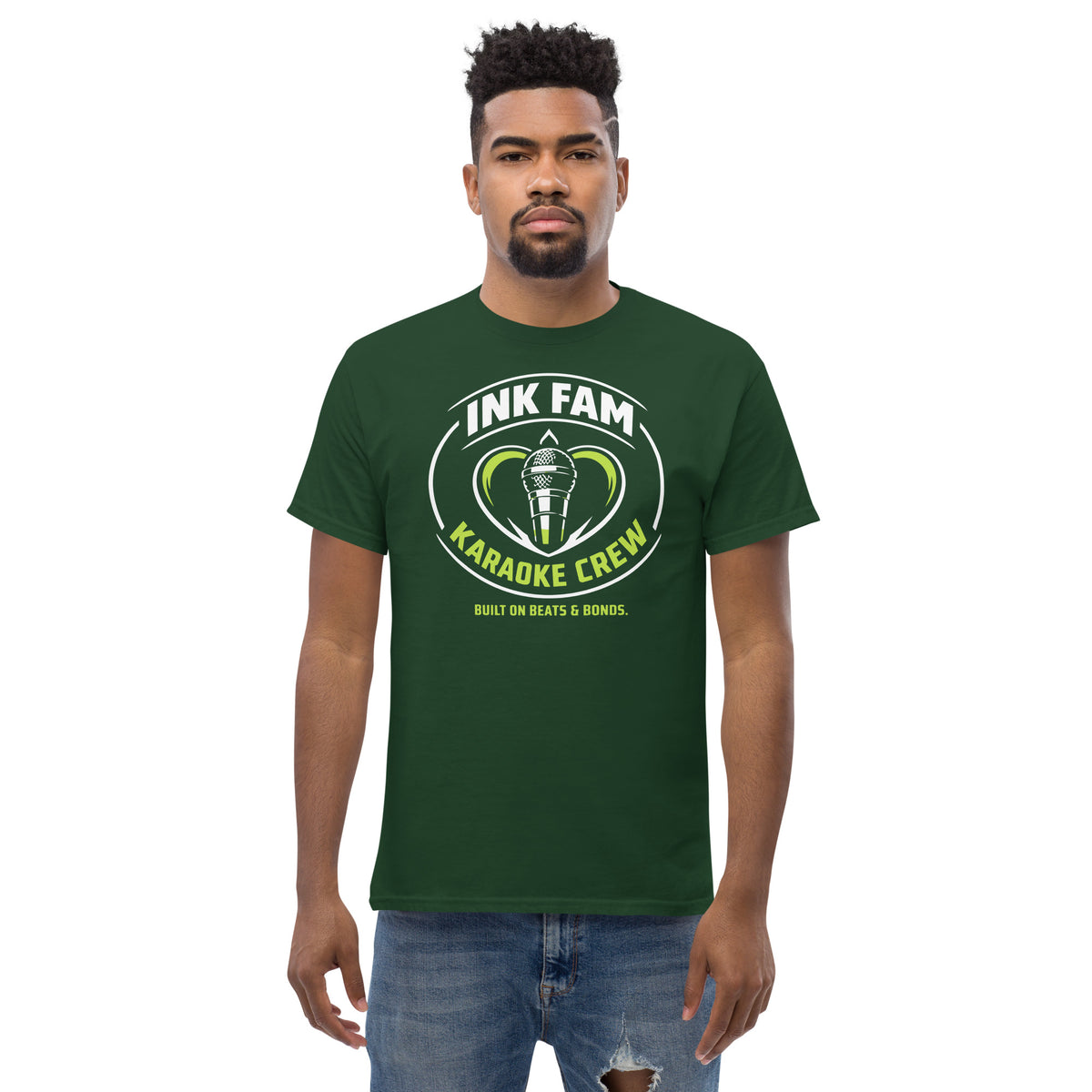 Forest Green classic T-shirt, front view, featuring DJ Ink Fam green-and-white circular microphone badge.