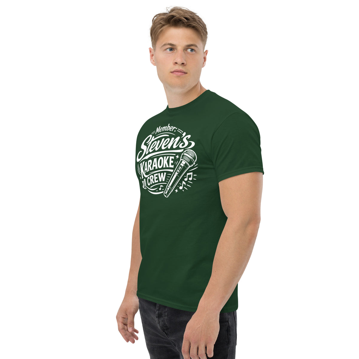 Forest Green classic T-shirt, left-front angled view, featuring Steven's Karaoke Crew lettering and microphone graphic.