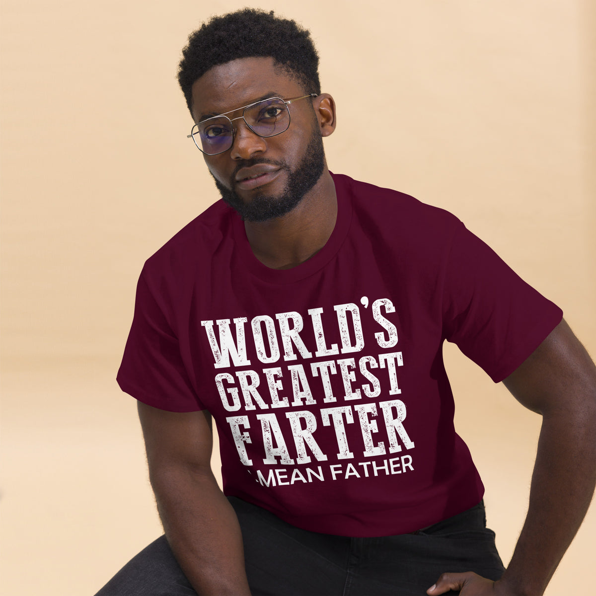 Maroon classic T-shirt, alternate front mockup, featuring white World's Greatest Farter, I Mean Father lettering.