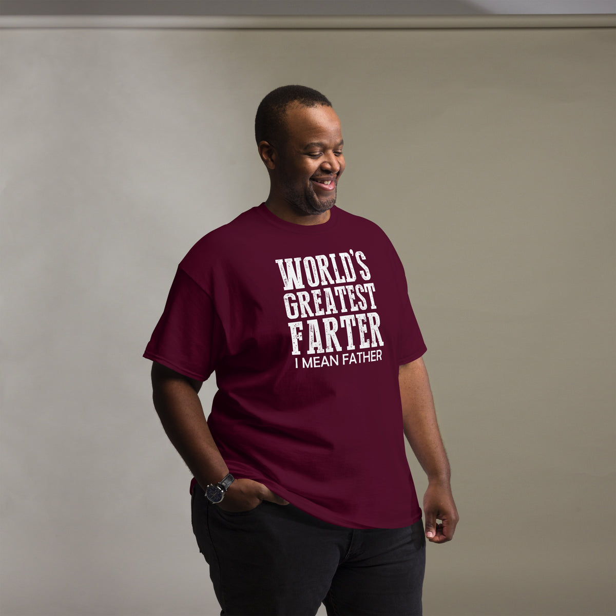 Maroon classic T-shirt, front view, featuring white World's Greatest Farter, I Mean Father lettering.
