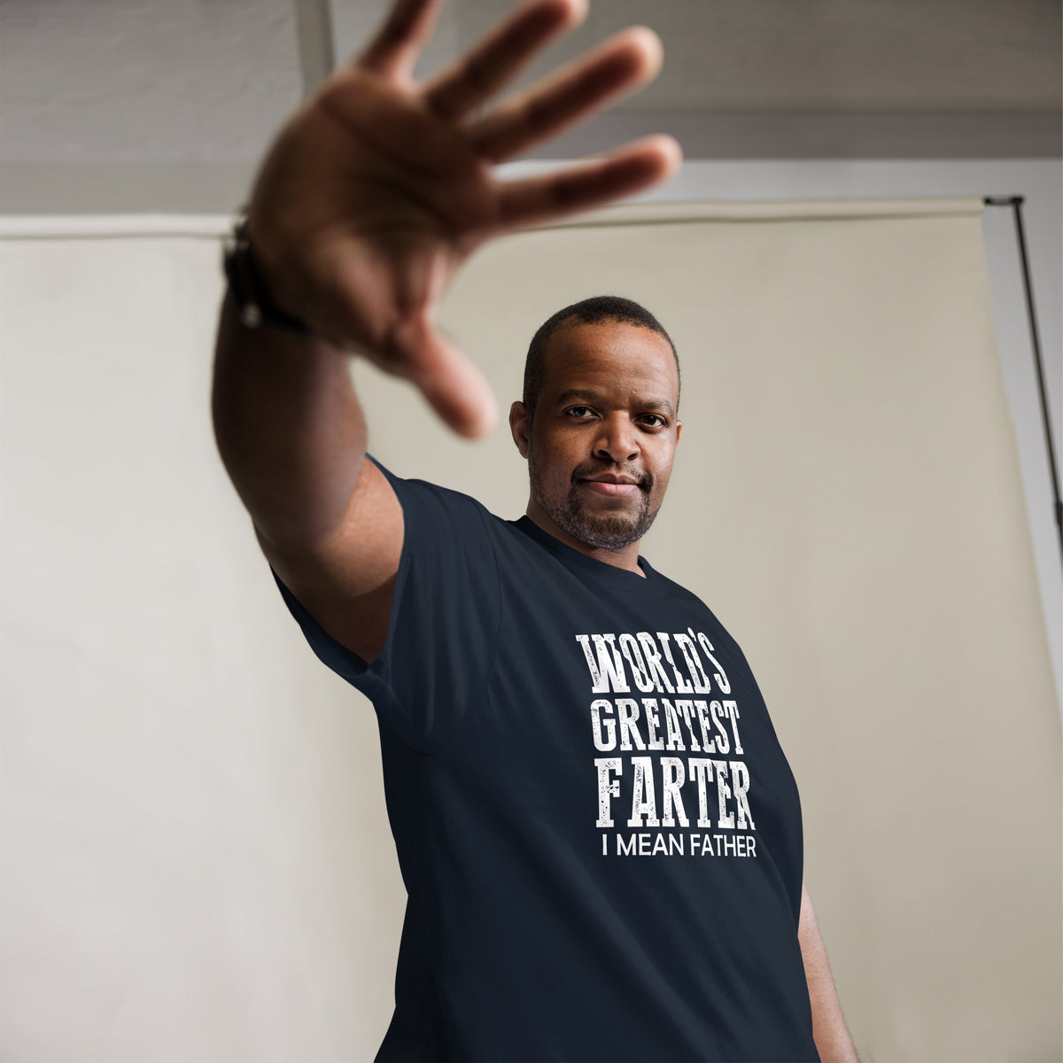 Navy classic T-shirt, alternate front mockup, featuring white World's Greatest Farter, I Mean Father lettering.