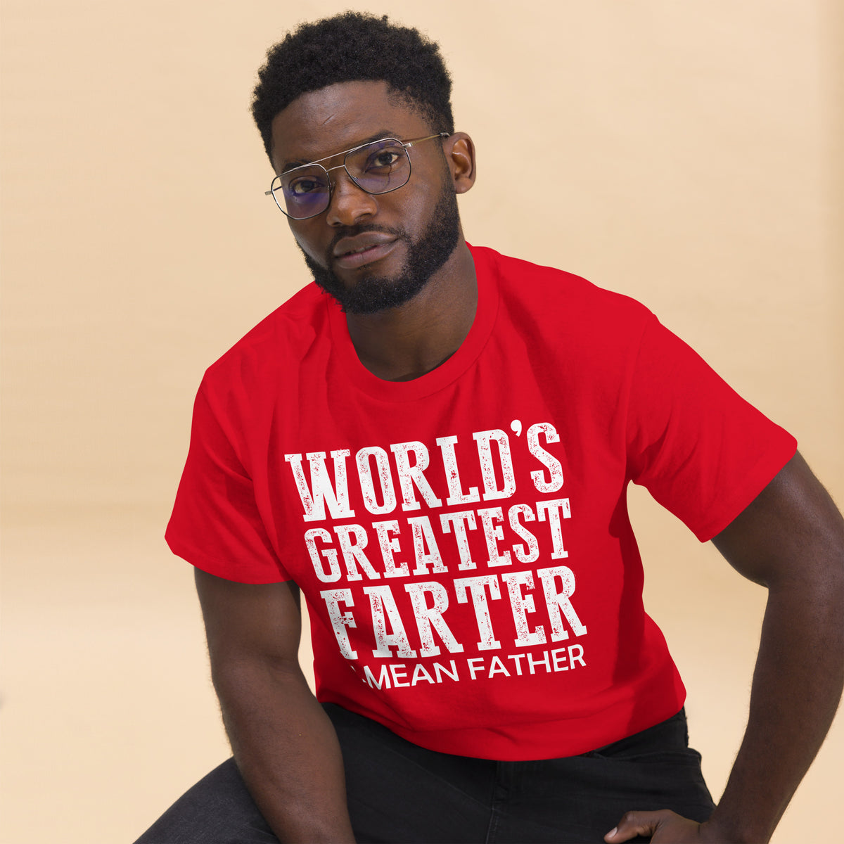 Red classic T-shirt, alternate front mockup, featuring white World's Greatest Farter, I Mean Father lettering.