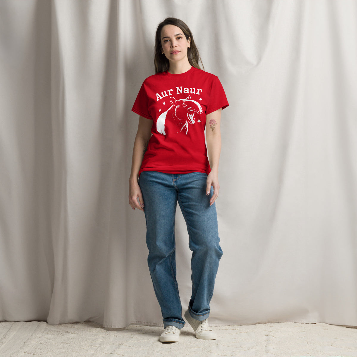 Red classic T-shirt, front view, featuring Aur Naur white tapir portrait, stars and lettering.