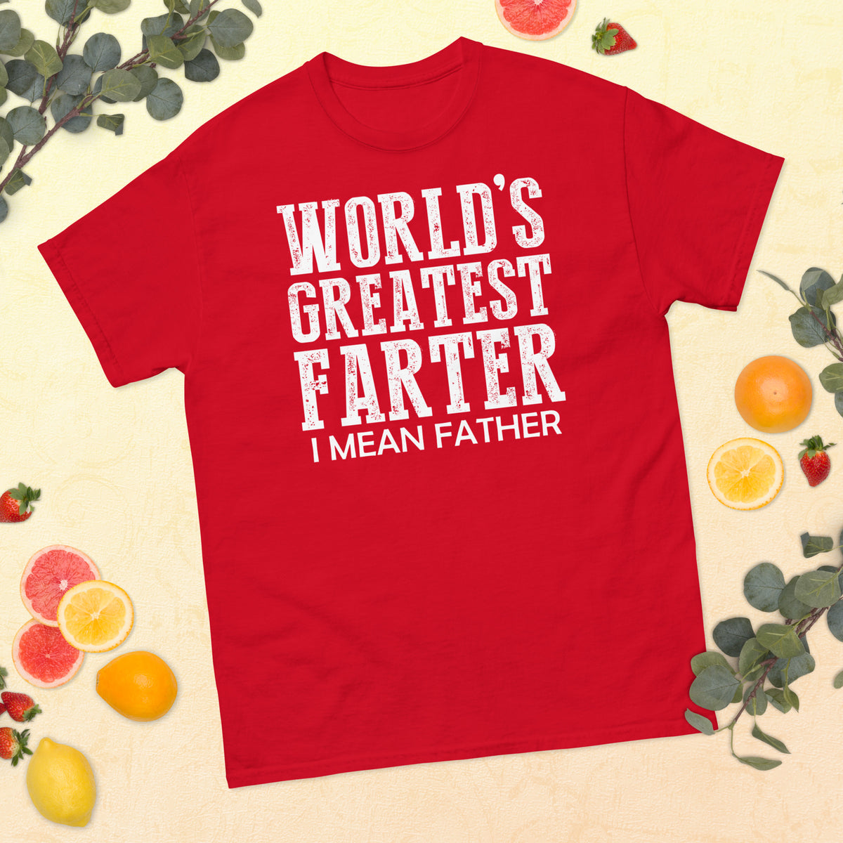 Red classic T-shirt, front view, featuring white World's Greatest Farter, I Mean Father lettering.