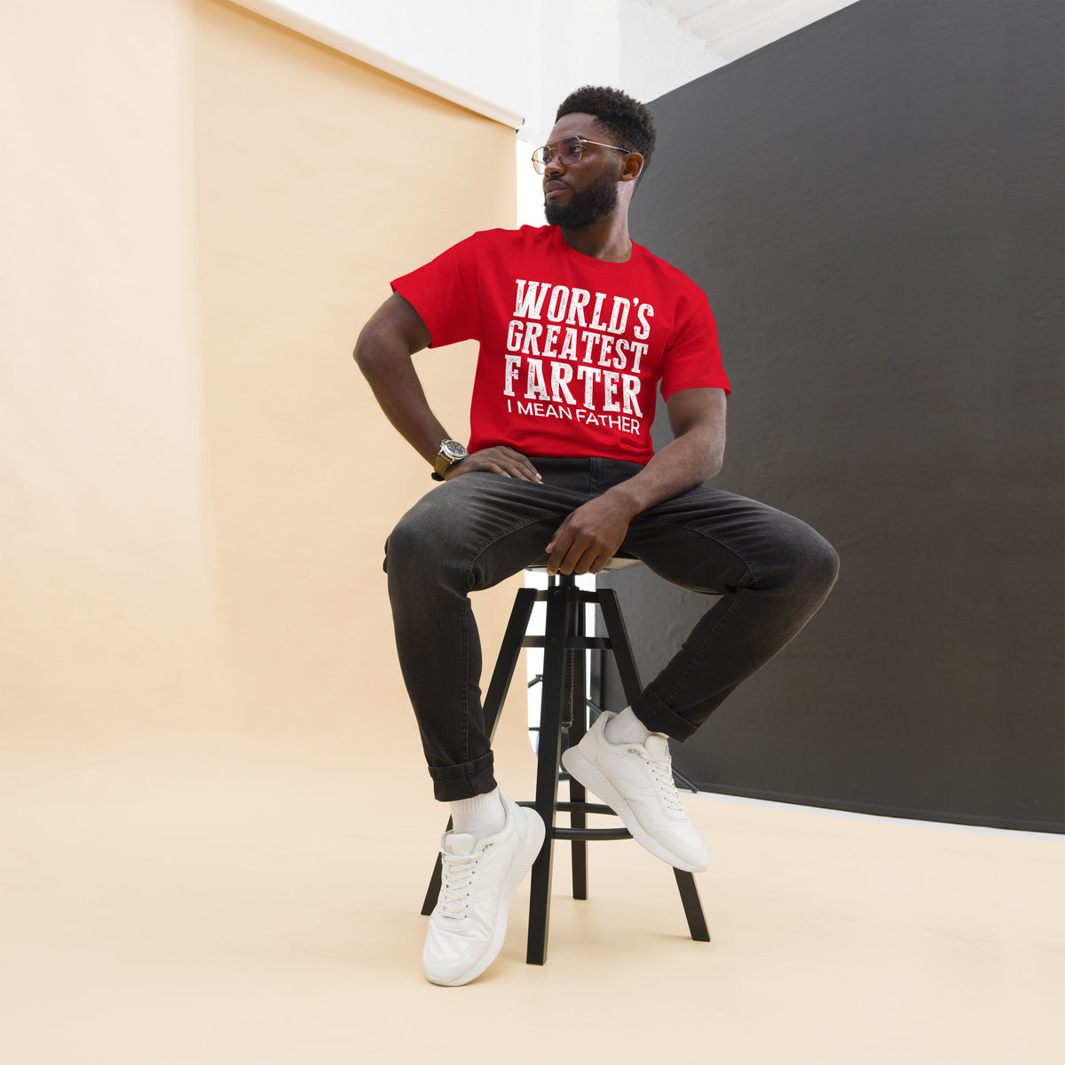 Red classic T-shirt, front view, featuring white World's Greatest Farter, I Mean Father lettering.