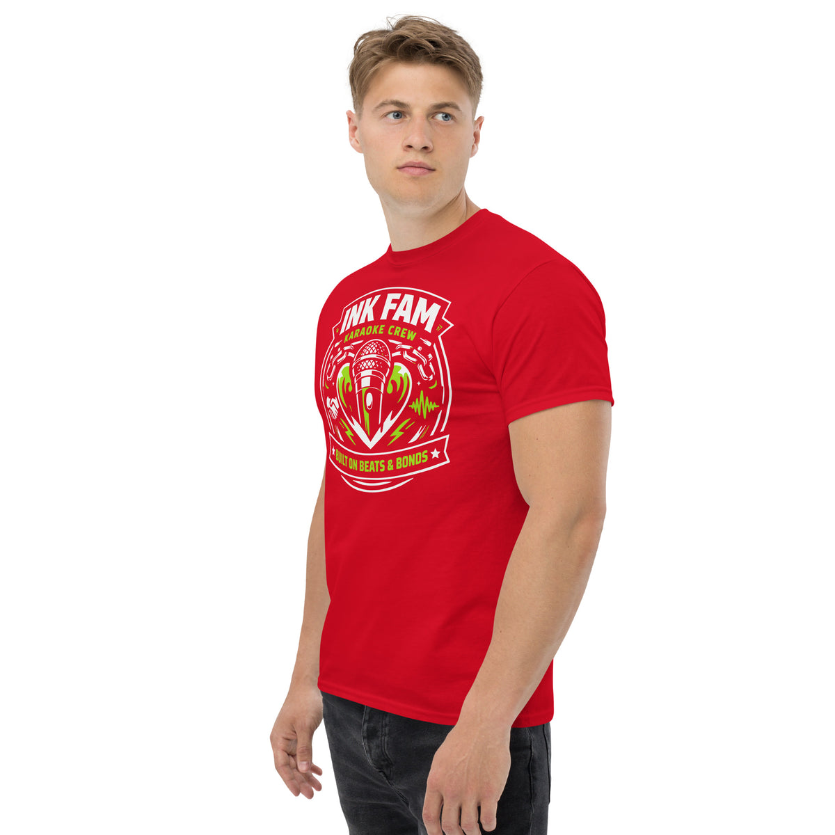 Red classic T-shirt, left-front angled view, featuring DJ Ink Beats & Bonds shield with a microphone and green-and-white lettering.
