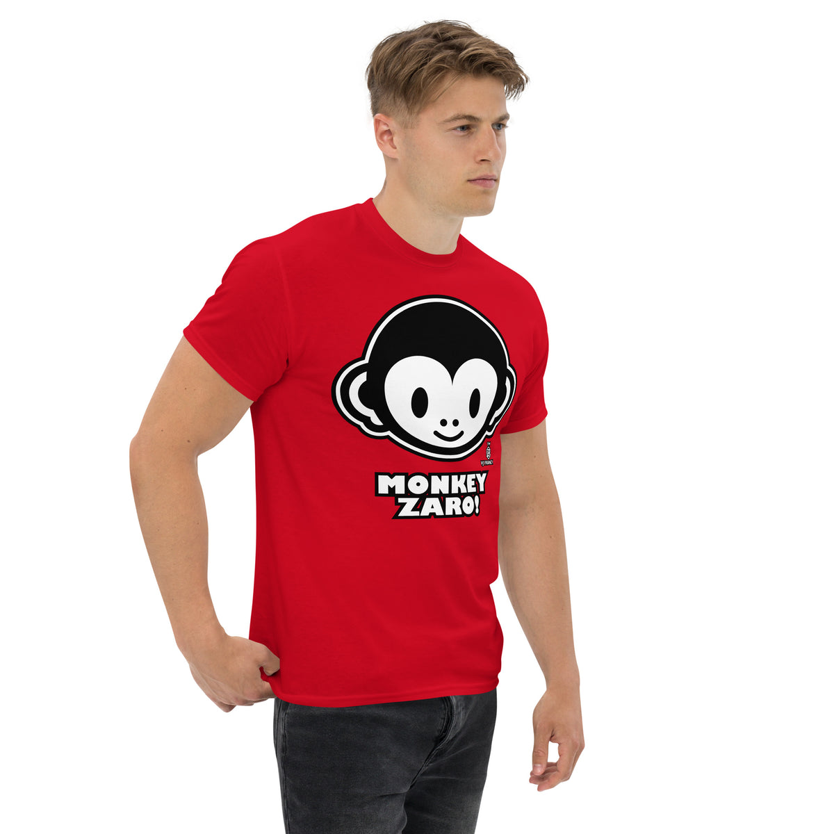 Red classic T-shirt, right-front angled view, featuring Monkey Zaro! white cartoon monkey face and lettering.