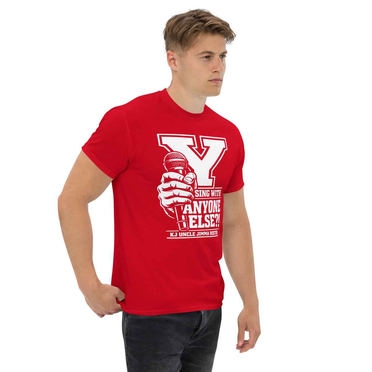 Red classic T-shirt, right-front angled view, featuring Uncle Jimma Roster Anthem varsity Y with hand-held microphone.