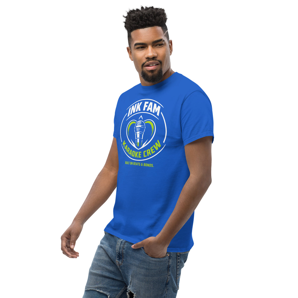 Royal classic T-shirt, left-front angled view, featuring DJ Ink Fam green-and-white circular microphone badge.