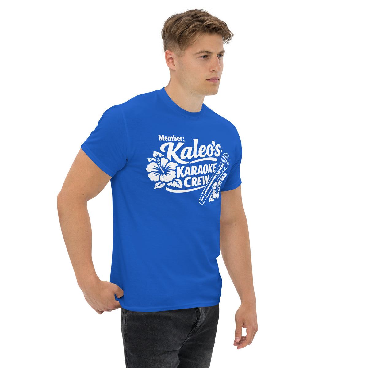 Royal classic T-shirt, right-front angled view, featuring Kaleo's Karaoke Crew lettering, microphone, and hibiscus flowers.