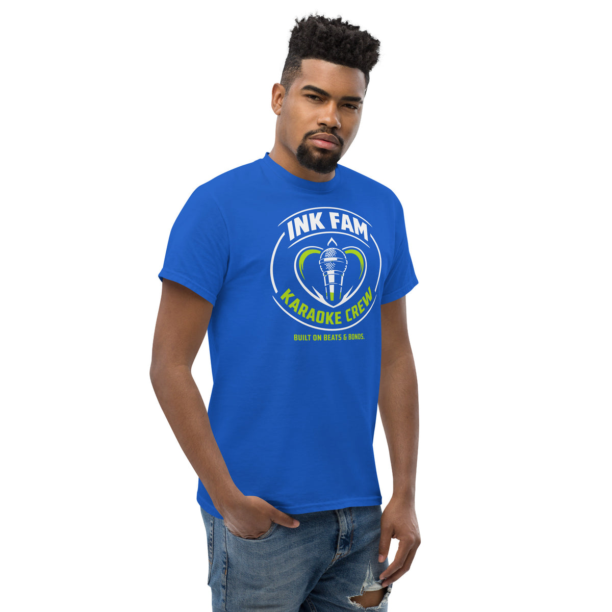Royal classic T-shirt, right-front angled view, featuring DJ Ink Fam green-and-white circular microphone badge.