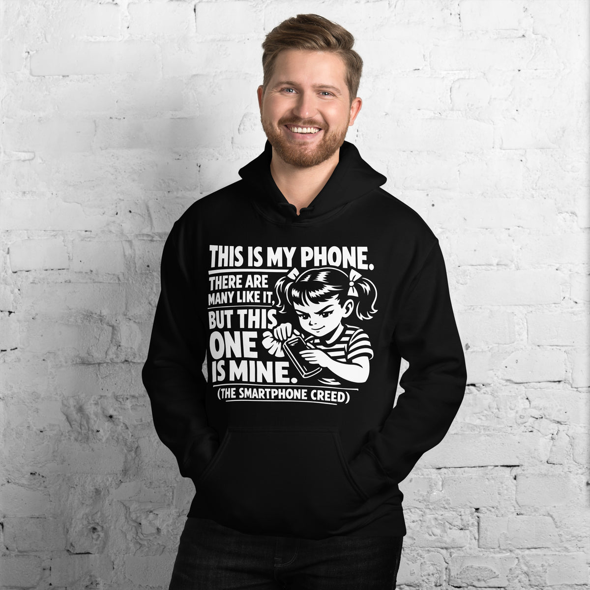 Black pullover hoodie, front view, showing a mockup for Smartphone Creed retro woman holding a phone and statement lettering.