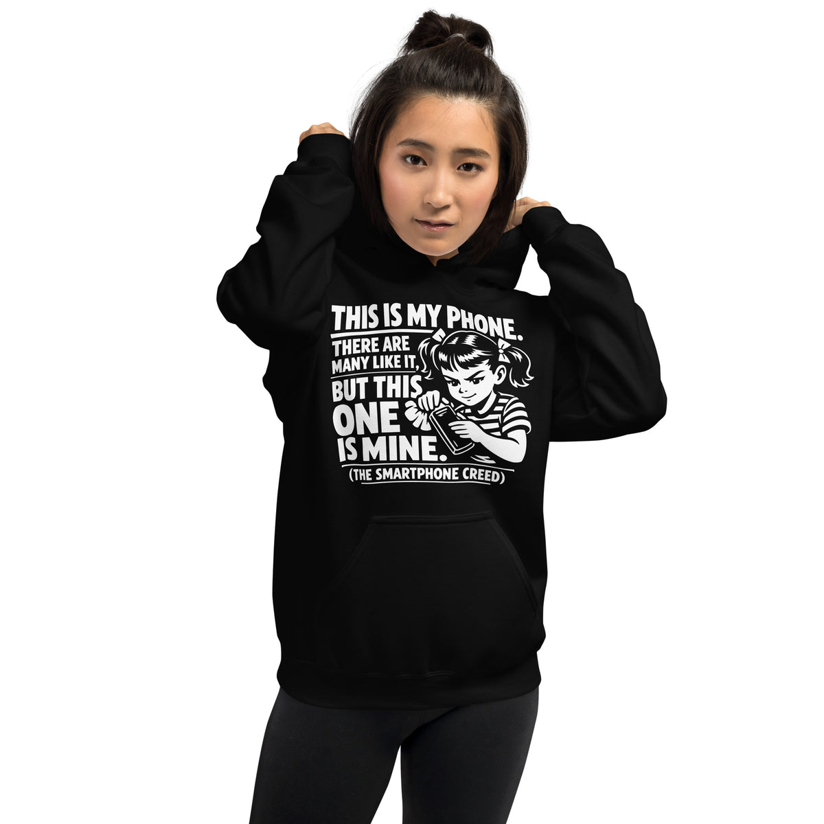 Black pullover hoodie, front view, showing a mockup for Smartphone Creed retro woman holding a phone and statement lettering.