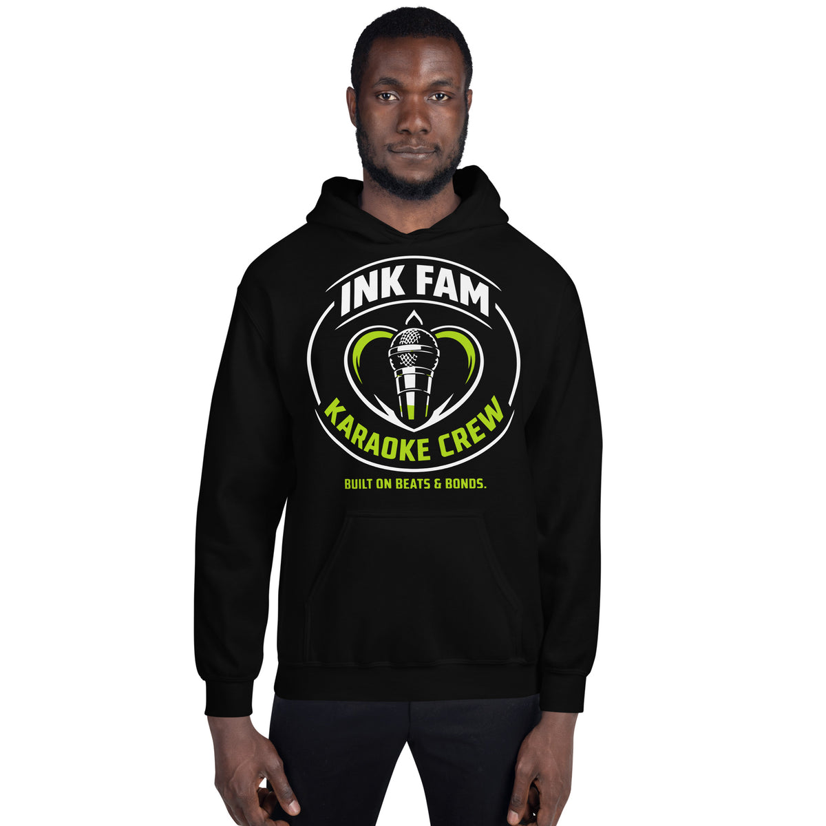 Black pullover hoodie, front view, featuring the green-and-white circular DJ Ink Fam microphone badge.