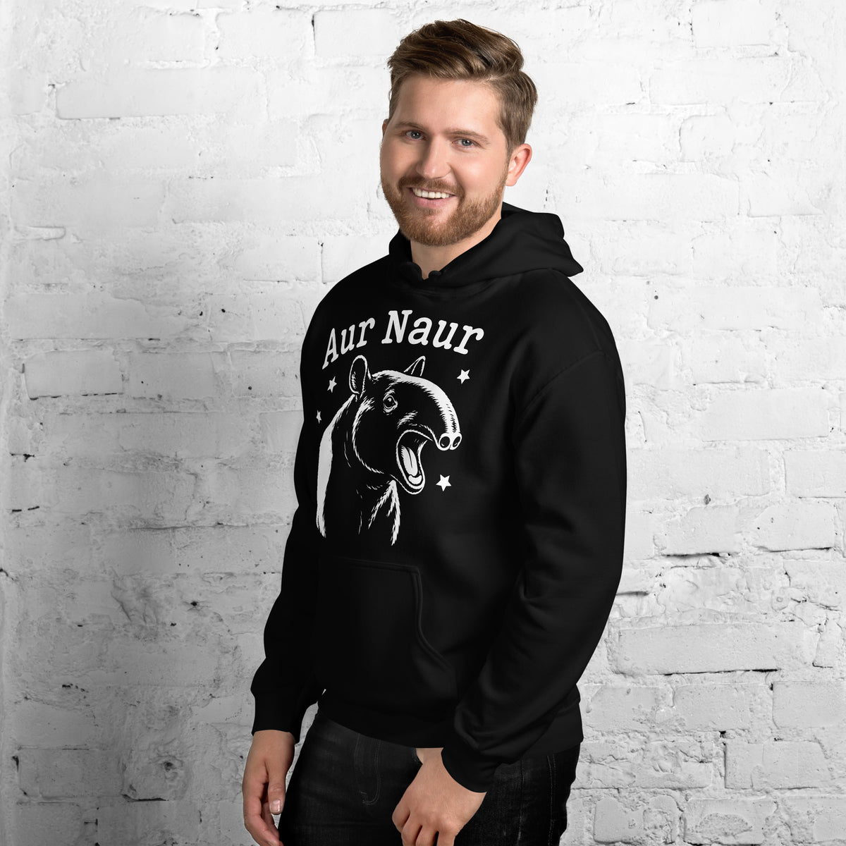 Black pullover hoodie, left-front angled view, featuring Aur Naur white tapir portrait, stars and lettering.