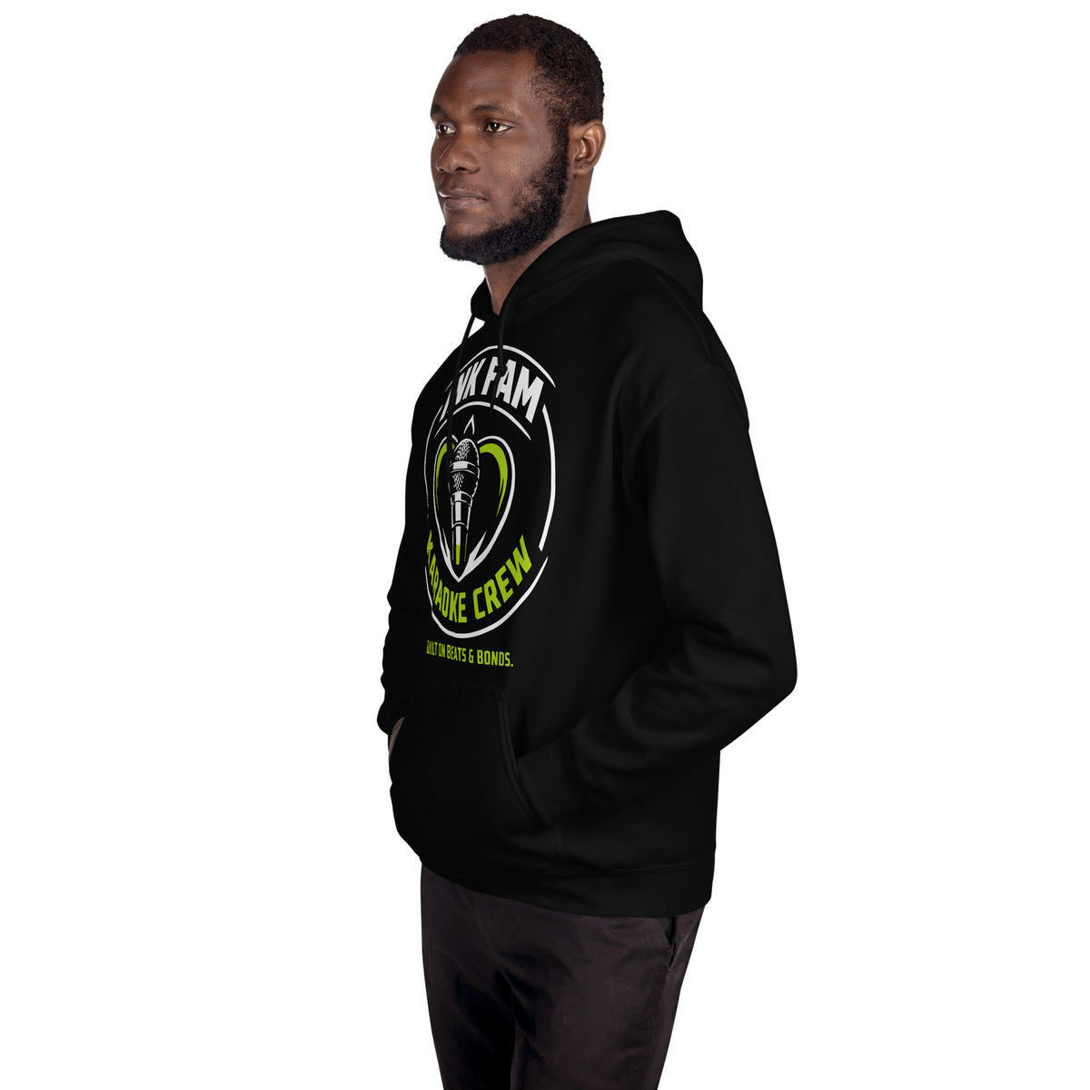 Black pullover hoodie, left-front angled view, featuring the green-and-white circular DJ Ink Fam microphone badge.