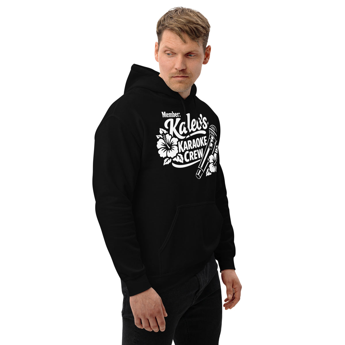 Black pullover hoodie, right-front angled view, featuring Kaleo's Karaoke Crew lettering, microphone, and hibiscus flowers.