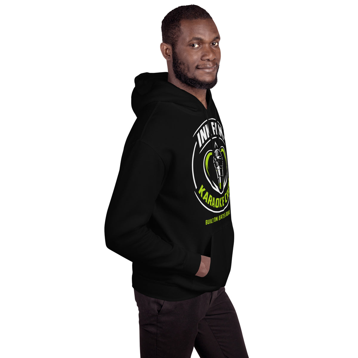 Black pullover hoodie, right-front angled view, featuring the green-and-white circular DJ Ink Fam microphone badge.