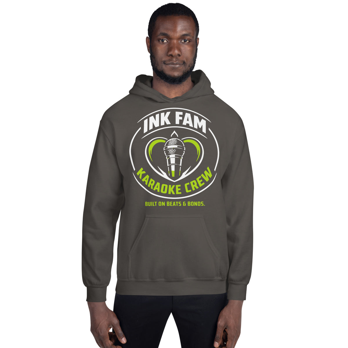 Charcoal pullover hoodie, front view, featuring the green-and-white circular DJ Ink Fam microphone badge.