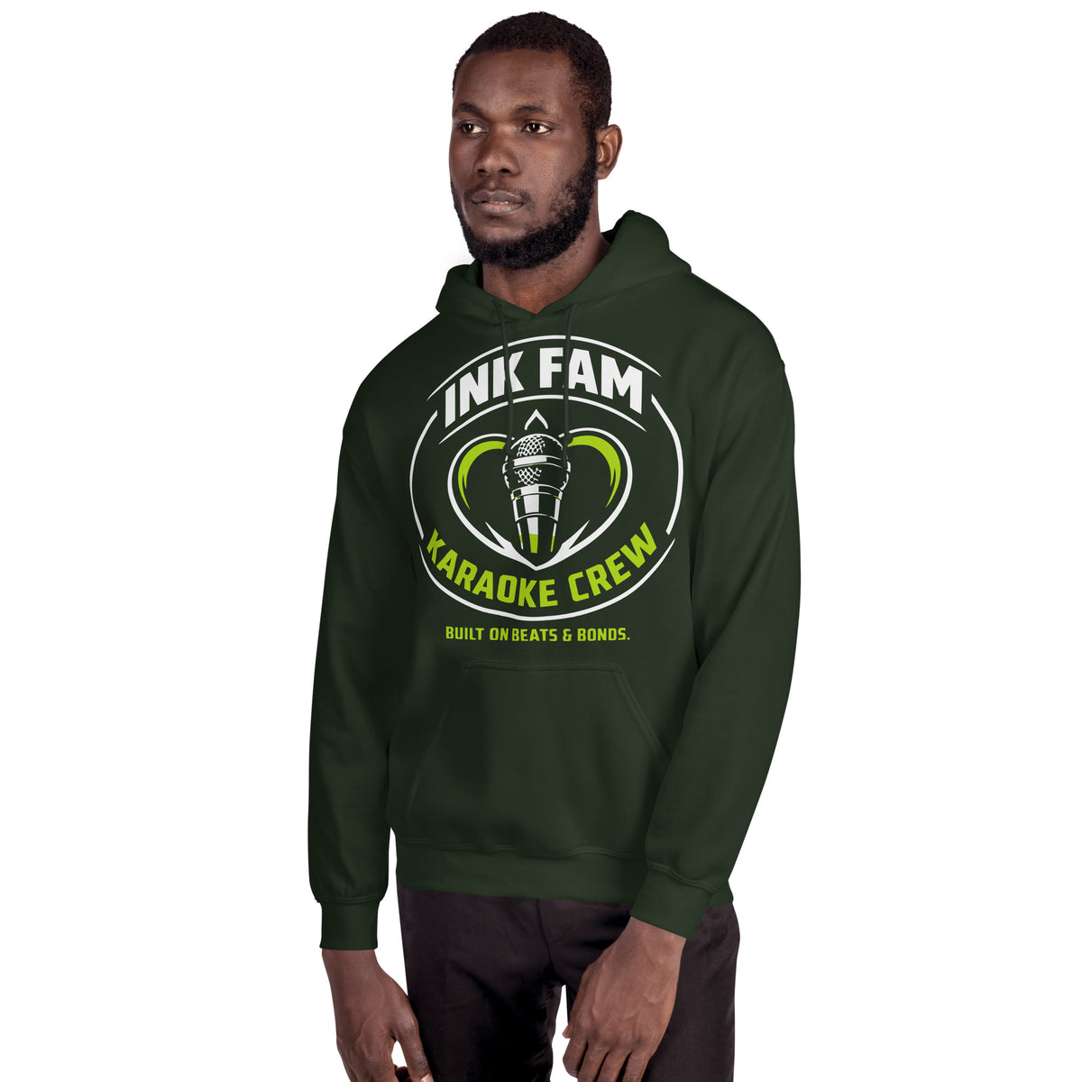 Forest Green pullover hoodie, alternate front mockup, featuring the green-and-white circular DJ Ink Fam microphone badge.