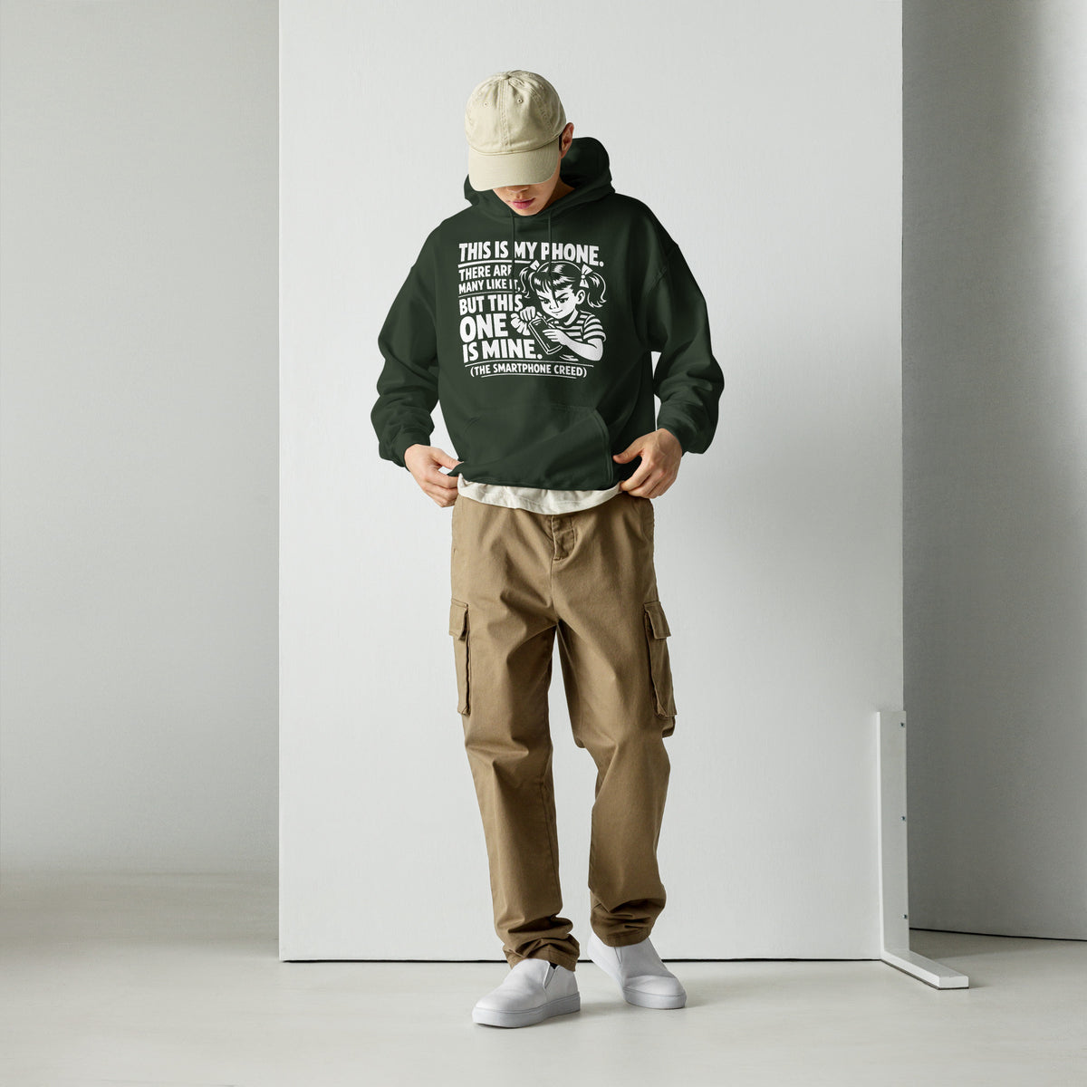 Forest Green pullover hoodie, front view, showing a mockup for Smartphone Creed retro woman holding a phone and statement lettering.