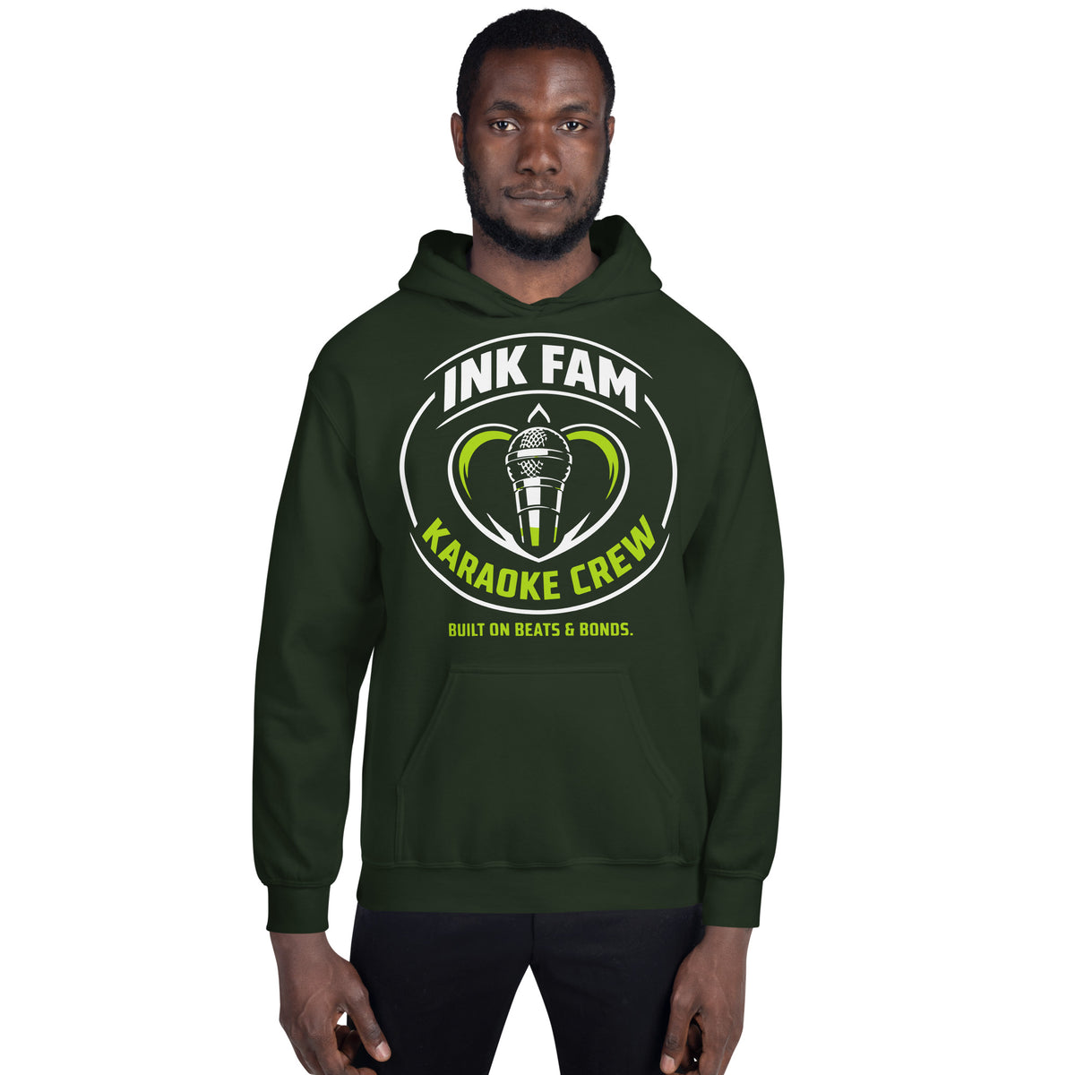 Forest Green pullover hoodie, front view, featuring the green-and-white circular DJ Ink Fam microphone badge.