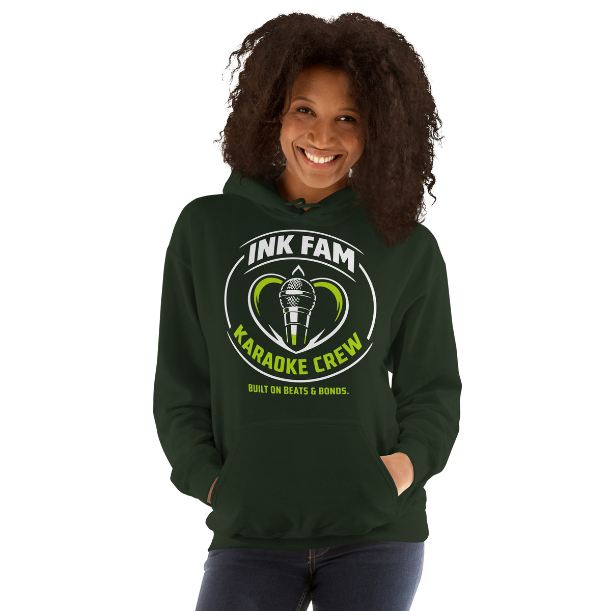 Forest Green pullover hoodie, front view, featuring the green-and-white circular DJ Ink Fam microphone badge.