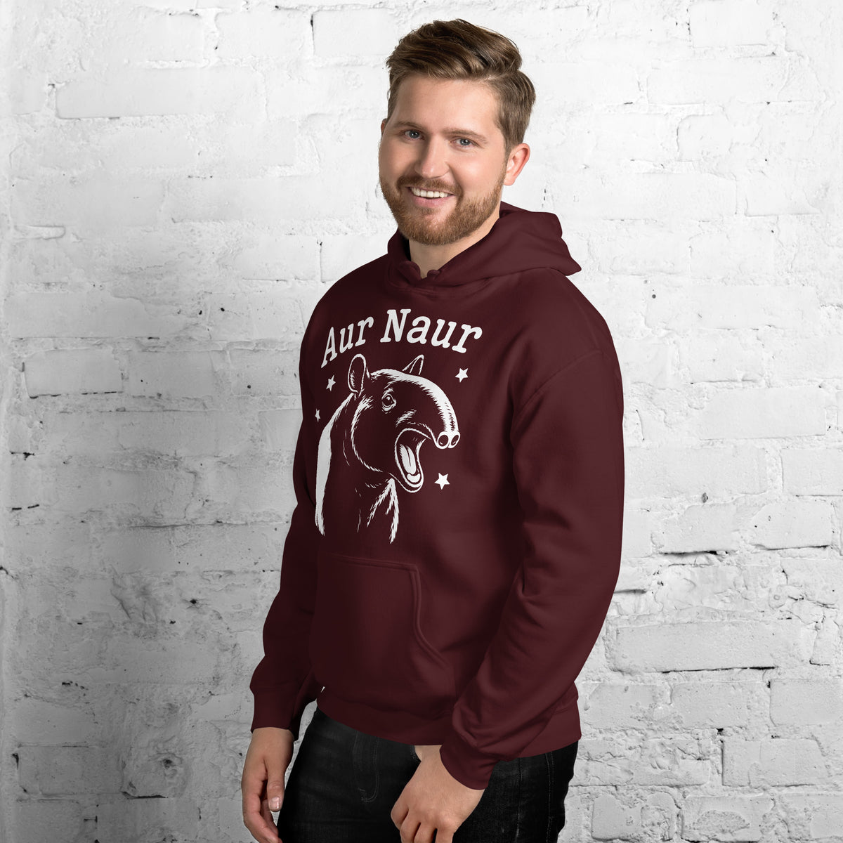 Maroon pullover hoodie, left-front angled view, featuring Aur Naur white tapir portrait, stars and lettering.