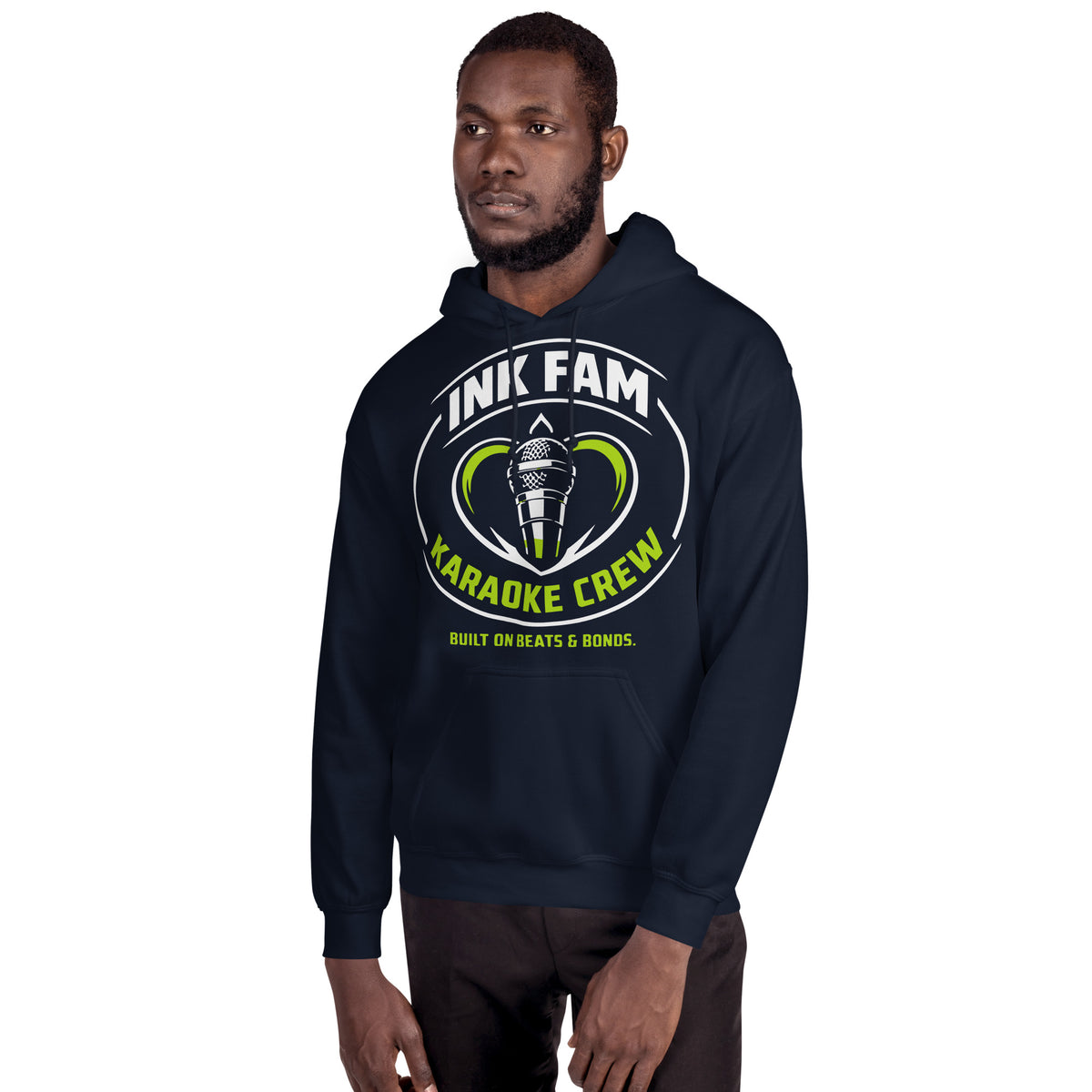 Navy pullover hoodie, alternate front mockup, featuring the green-and-white circular DJ Ink Fam microphone badge.