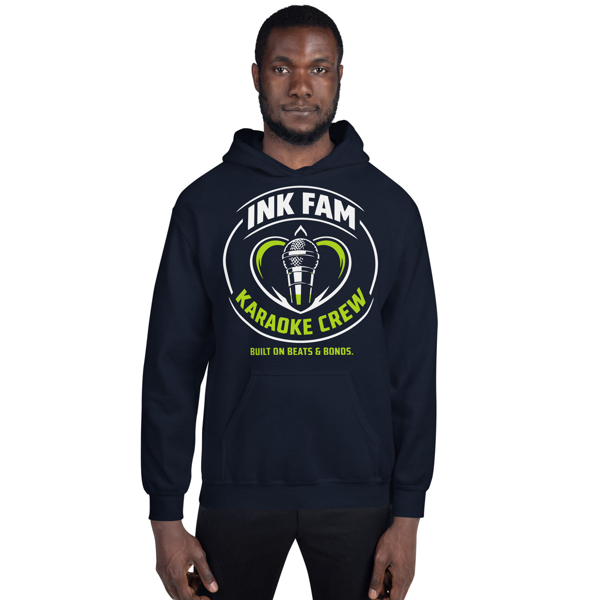 Navy pullover hoodie, front view, featuring the green-and-white circular DJ Ink Fam microphone badge.
