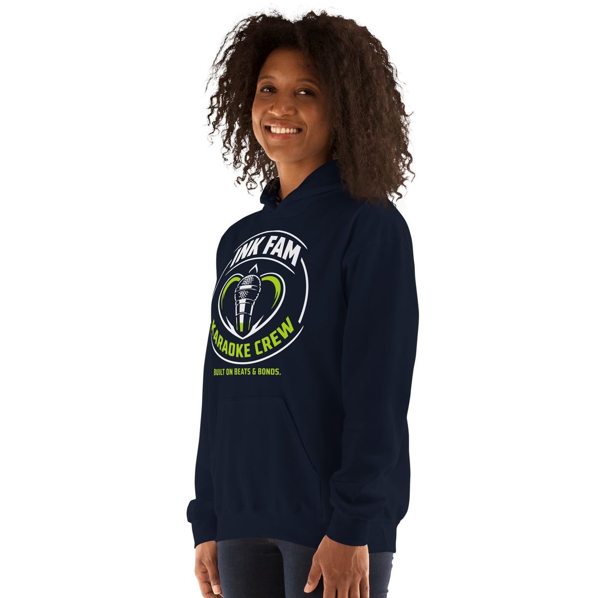 Navy pullover hoodie, left-front angled view, featuring the green-and-white circular DJ Ink Fam microphone badge.
