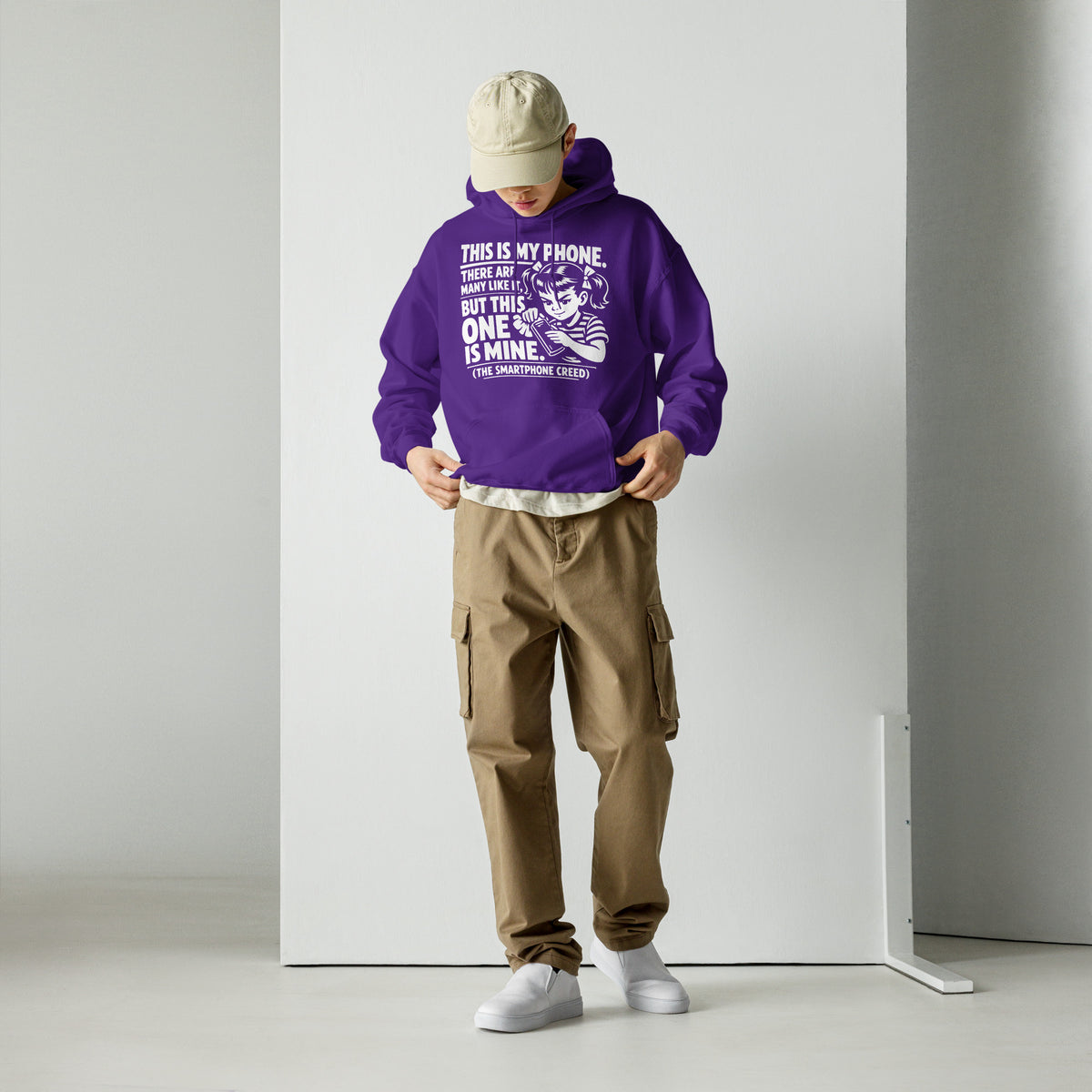 Purple pullover hoodie, front view, showing a mockup for Smartphone Creed retro woman holding a phone and statement lettering.