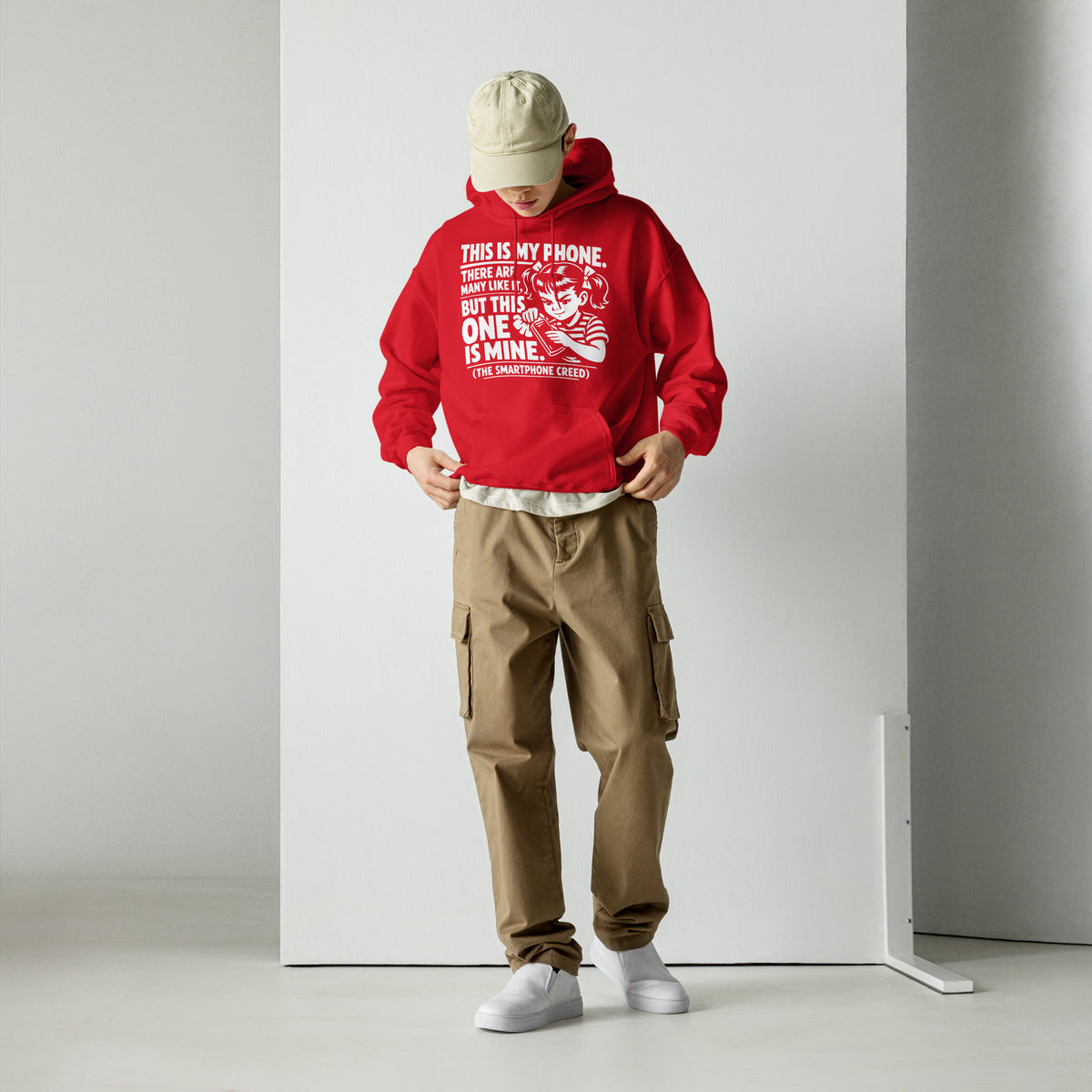 Red pullover hoodie, front view, showing a mockup for Smartphone Creed retro woman holding a phone and statement lettering.