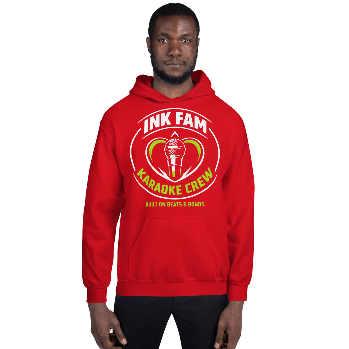 Red pullover hoodie, front view, featuring the green-and-white circular DJ Ink Fam microphone badge.