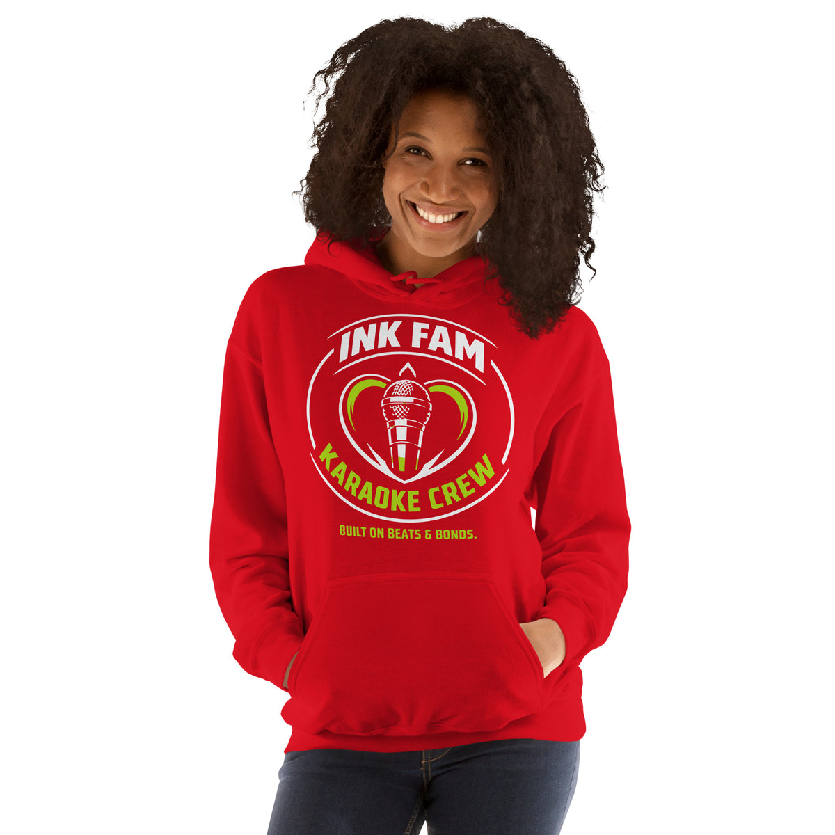 Red pullover hoodie, front view, featuring the green-and-white circular DJ Ink Fam microphone badge.