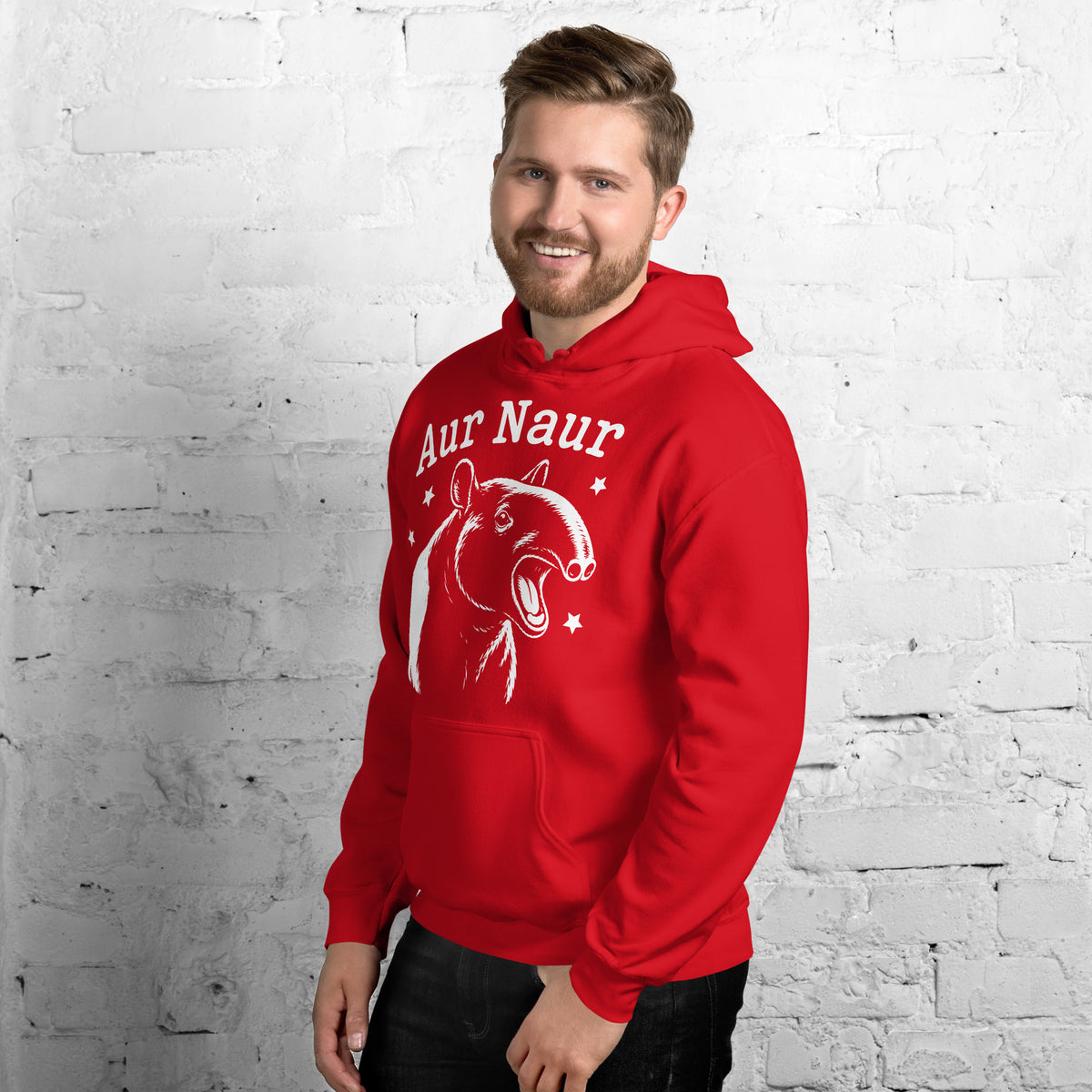 Red pullover hoodie, left-front angled view, featuring Aur Naur white tapir portrait, stars and lettering.