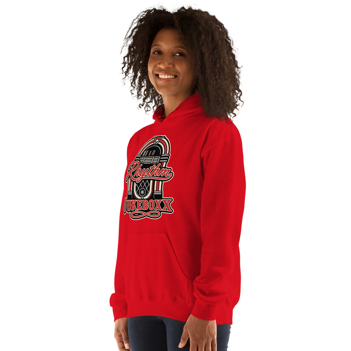 Red pullover hoodie, left-front angled view, featuring Rhythm Jukeboxx red-and-cream retro jukebox graphic.