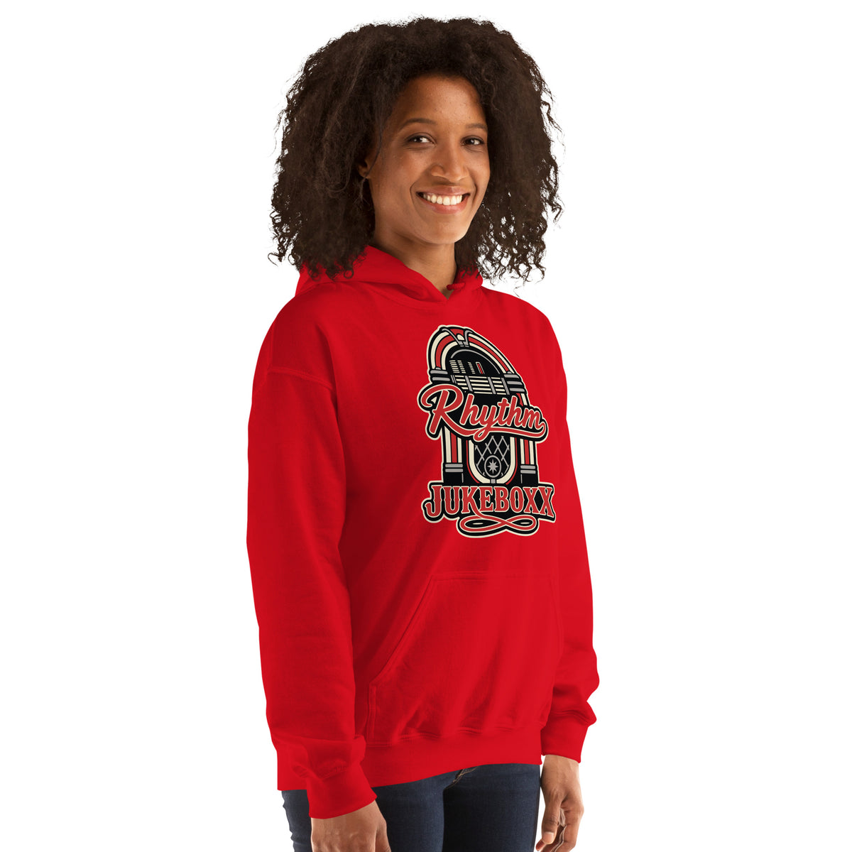 Red pullover hoodie, right-front angled view, featuring Rhythm Jukeboxx red-and-cream retro jukebox graphic.