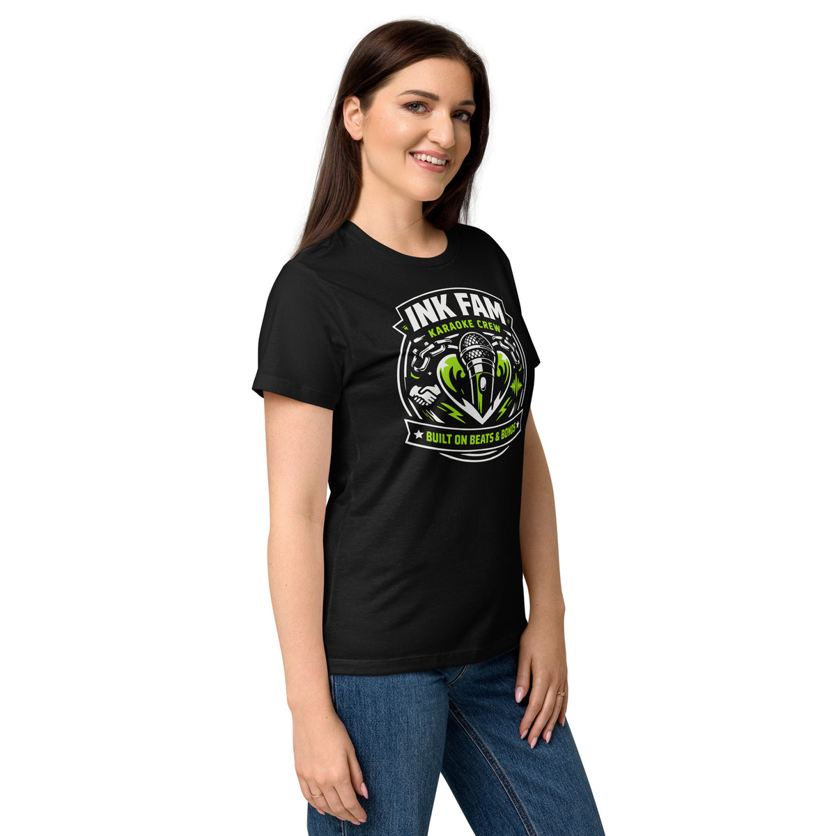 Black women's T-shirt, right-front angled view, featuring DJ Ink Beats & Bonds shield with a microphone and green-and-white lettering.