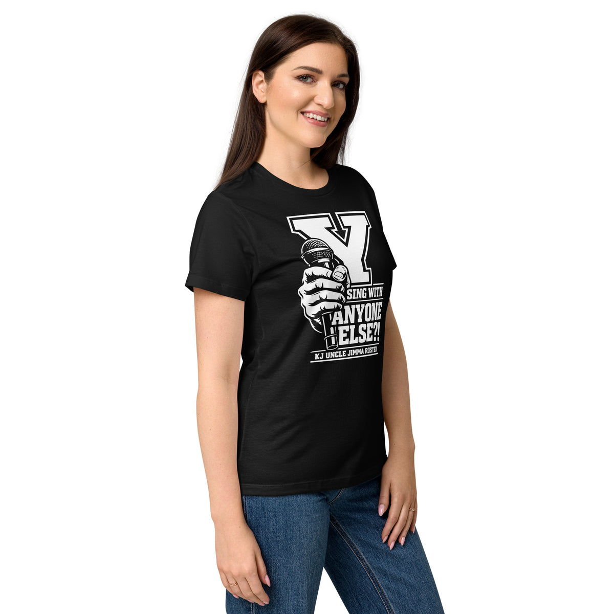 Black women's T-shirt, right-front angled view, featuring Uncle Jimma Roster Anthem varsity Y with hand-held microphone.