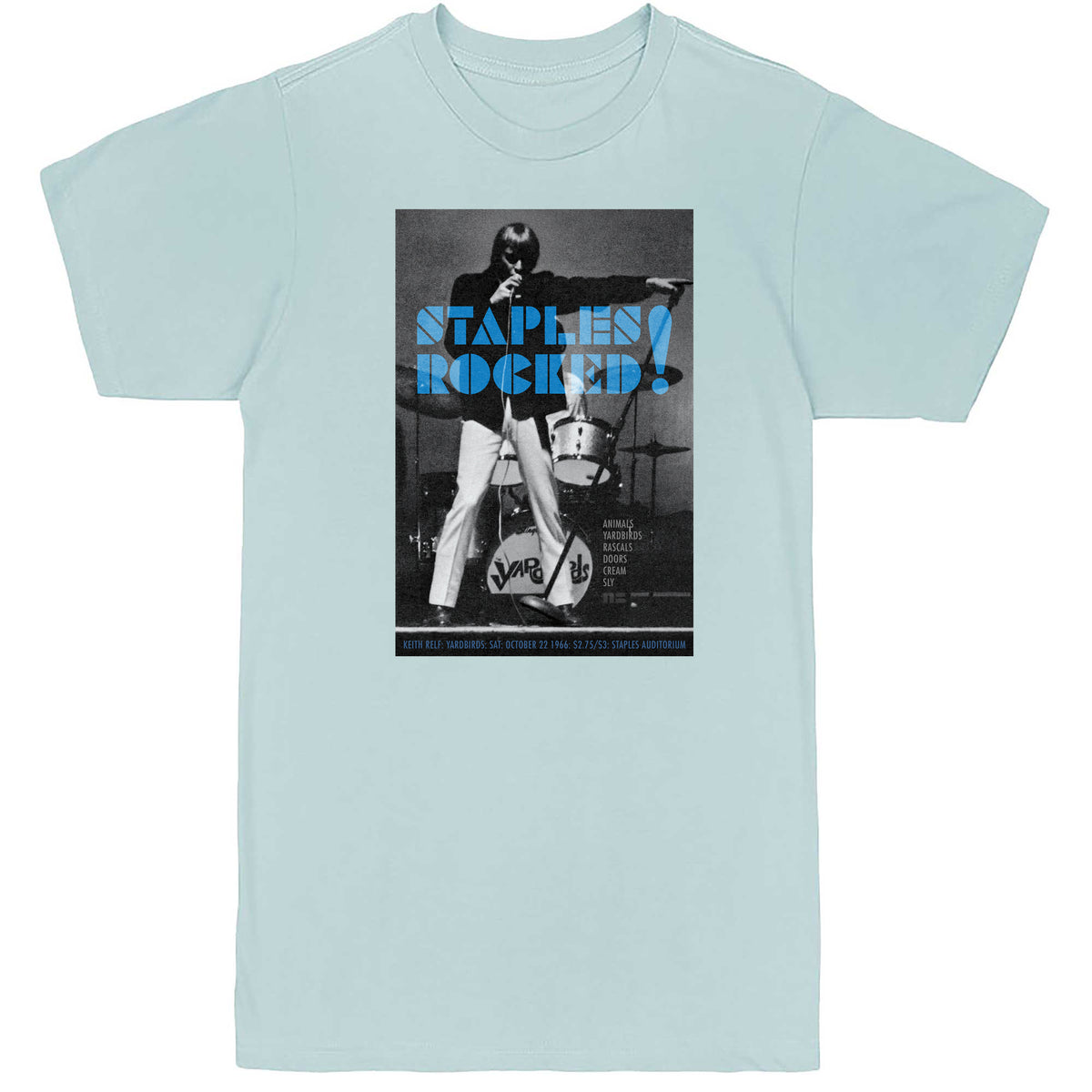 Pale blue T-shirt featuring a black-and-white Keith Relf performance photograph and blue “Staples Rocked!” lettering.