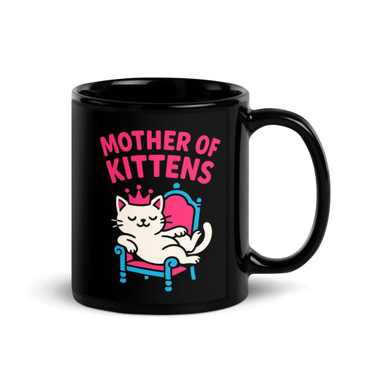 Black glossy mug, 11 oz, handle on right view, featuring a crowned white cat lounging on a pink and blue throne under pink Mother of Kittens lettering